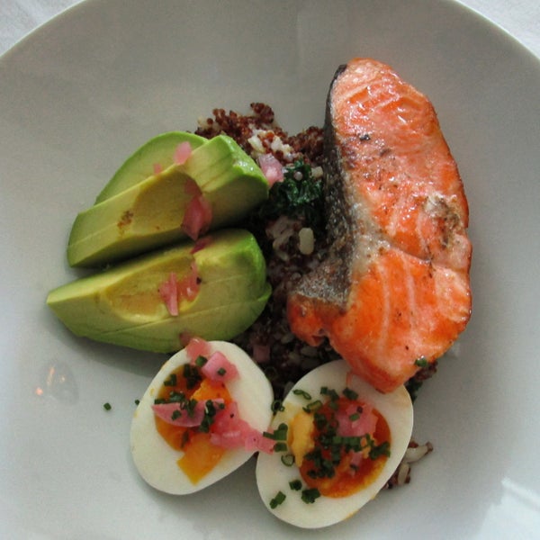 An absolutely delicious, stunning, abs healthy dish ( salmon, egg and avocado sitting on a bed of red quinoa, brown rice and kale). Everything I love in modern cooking!