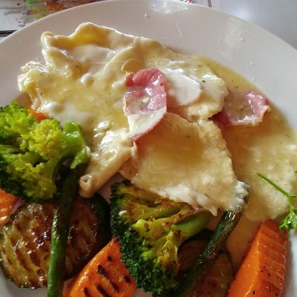 Definitely try: Chicken Saltimbocca:Sauteed and covered with prosciutto and mozzarella. Grilled veggies on the side.