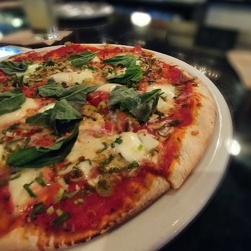 Grab a beer or 2 and order the garlic pizza! That fresh basil on top....YUM!
