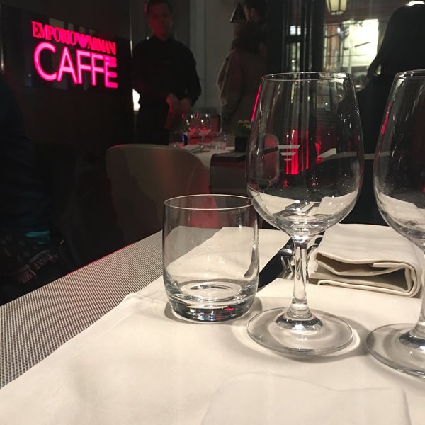 Photo taken at Emporio Armani Caffé by Techi on 2/10/2018