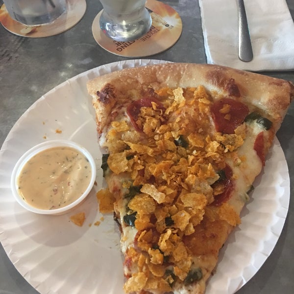 Photo taken at Empire Slice House by Brooke S. on 5/7/2018