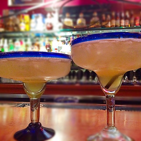 Photo taken at Zócalo Mexican Grill &amp; Tequilería by Katie R. on 4/20/2015