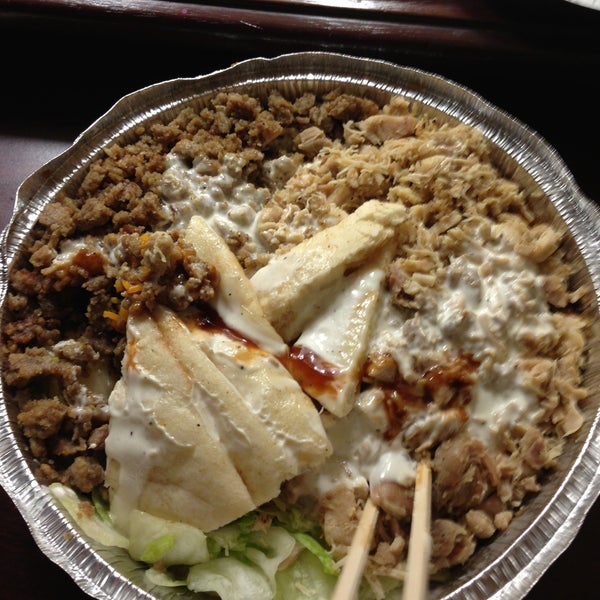 Photo taken at The Halal Guys by Yun M. on 5/18/2013
