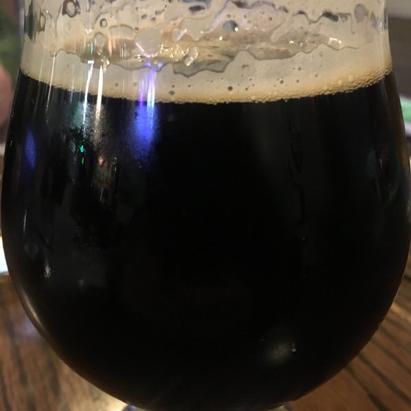 Photo taken at Strange Craft Beer Company by Robbie S. on 12/28/2019