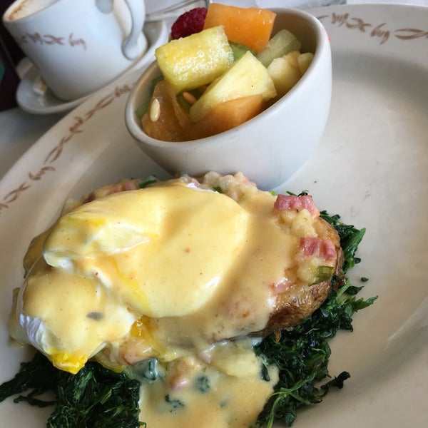Eggs Benedict on a baked potato. Brilliant!  Open early for pre-shopping brunch