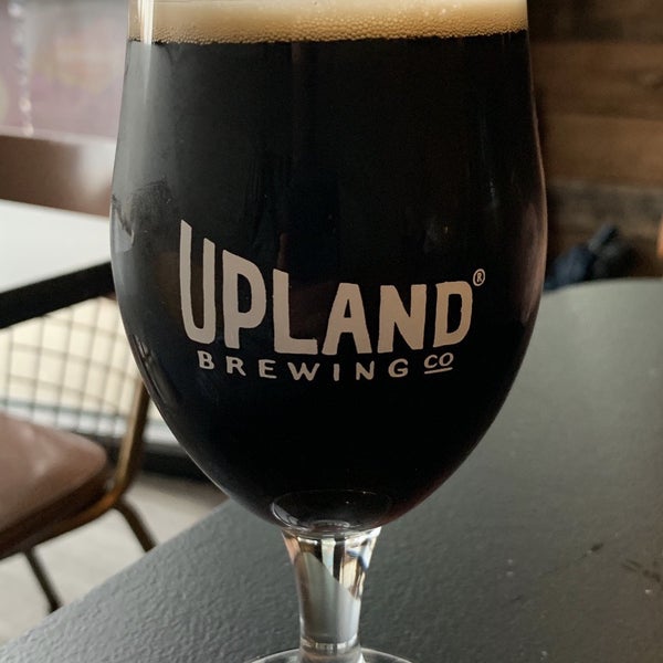 Photo taken at Upland Brewing Company Tasting Room by Dana G. on 3/12/2019
