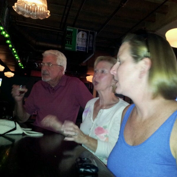 Photo taken at Ha&#39;Penny Bridge Irish Pub &amp; Grill by Michael P. on 7/26/2013