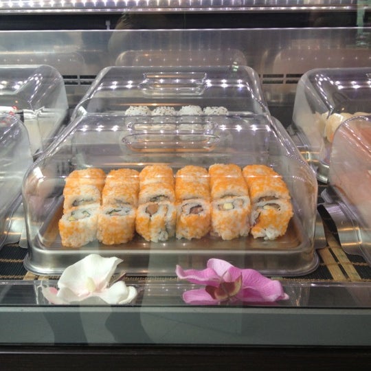 Photo taken at Sushi Store Express by Laura M. on 9/27/2012