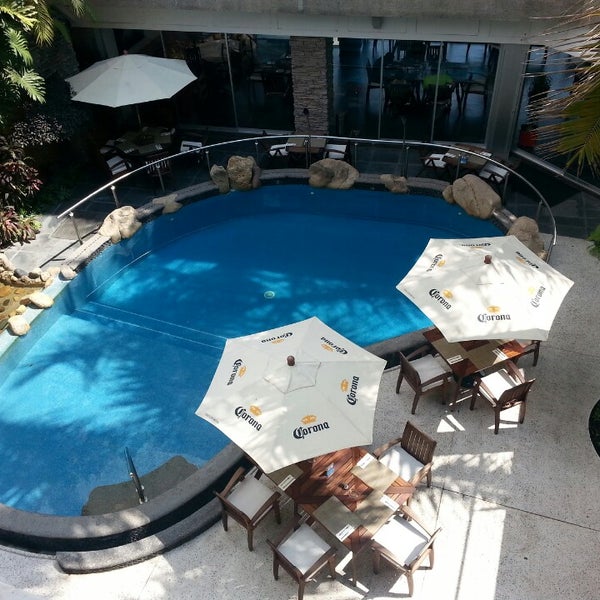 6/18/2013 tarihinde Jonathan C.ziyaretçi tarafından Hotel Rio Malecon'de çekilen fotoğraf