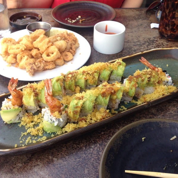 Photo taken at Sushi On The Rock by . on 4/4/2015