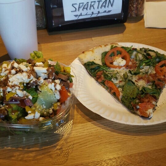 Photo taken at Spartan Pizza by Sophia H. on 12/7/2015