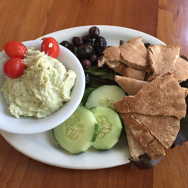 Photo taken at Moosewood Restaurant by E.T. C. on 9/5/2015
