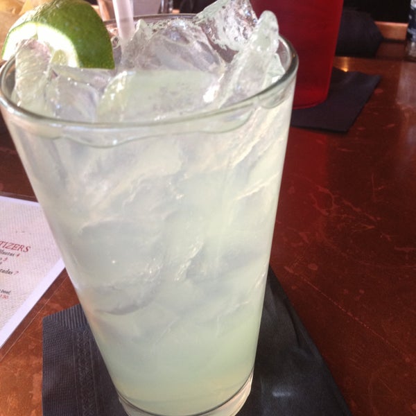 Photo taken at Roja Mexican Grill + Margarita Bar by Jamie W. on 4/27/2013
