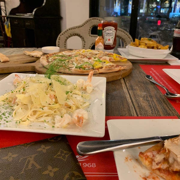 Photo taken at Pizza Pino Restaurant by Mohammed J. on 9/19/2019