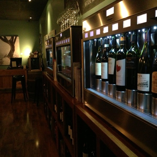 Photo taken at The Tasting Table Wine Shop by Adz on 6/20/2013