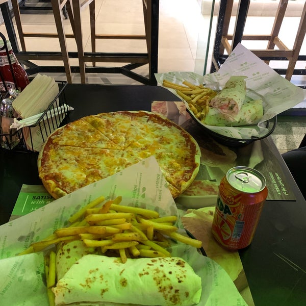 Photo taken at Zaatar w Zeit by Lo . on 10/12/2022