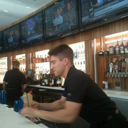 Photo taken at Champions Sports Bar by Kasey C. on 8/26/2011