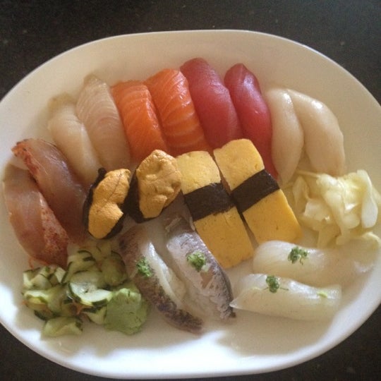 Photo taken at Sushi Delight by Tim C. on 5/19/2012