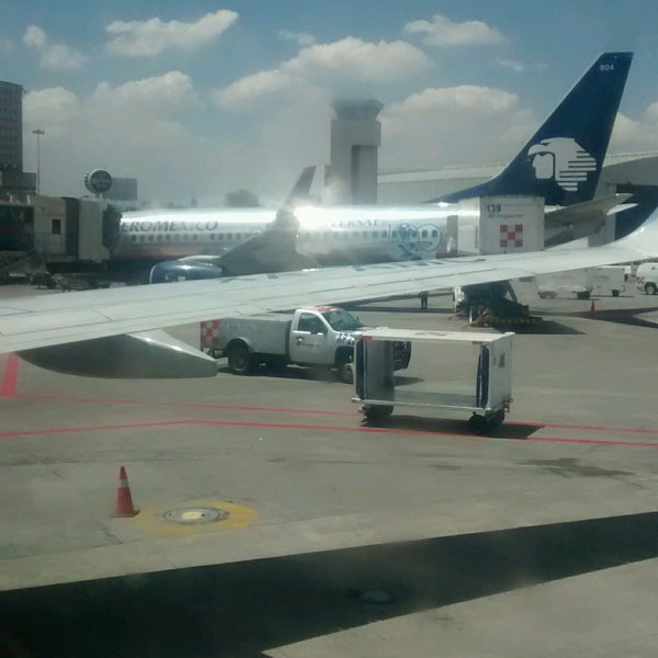 Photo taken at Mexico City Benito Juárez International Airport (MEX) by ElJohNyCe on 9/19/2016