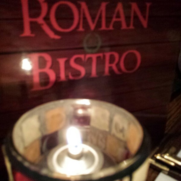 Foto tirada no(a) Roman Bistro por Rob D. em 1/16/2014