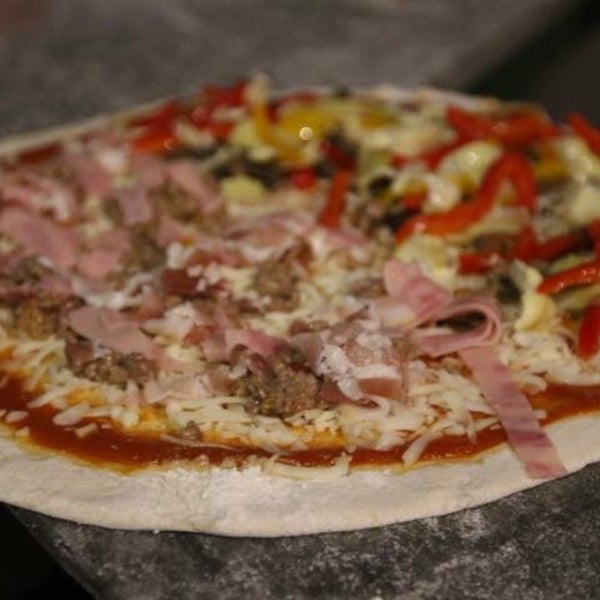 Photo taken at Buonissimo Trattoria-Pizzeria Italiana by Buonissimo Trattoria-Pizzeria Italiana on 6/9/2015