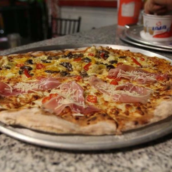 Das Foto wurde bei Buonissimo Trattoria-Pizzeria Italiana von Buonissimo Trattoria-Pizzeria Italiana am 6/9/2015 aufgenommen