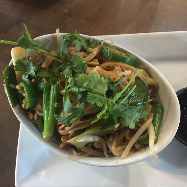 Photo taken at Lulu&#39;s Thai Noodle Shop by Suzanne R. on 5/22/2019