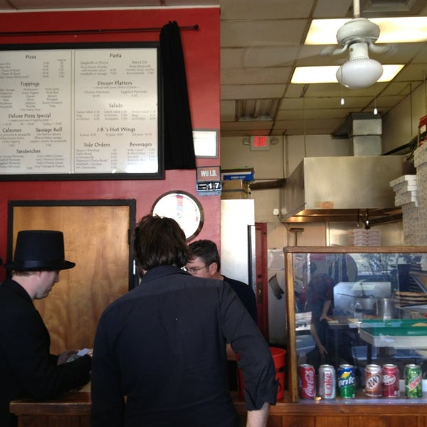 Photo taken at Joey Brooklyn&#39;s Famous Pizza by Jason K. on 2/17/2013