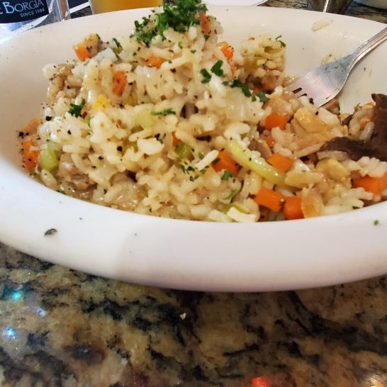 Please save your time and money. This place is not an authentic Italian place. Their food is bad, their owners is rude, And this is the risotto which is basically steamed rice and tasteless chicken