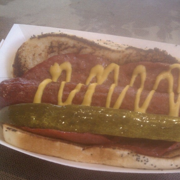 Photo taken at Greatest American Hot Dogs by Paul T. on 5/18/2014