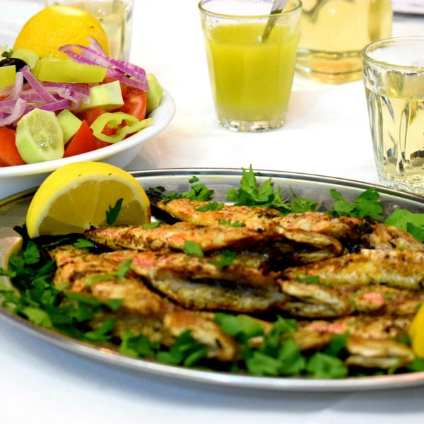 Grilled small red mullet fish restaurant in Greece. Fresh fish directly from the Varvakeios fish market (Athens central Market)!