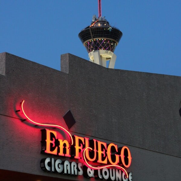 Photo taken at En Fuego Cigars &amp; Lounge by Rusty S. on 4/20/2014