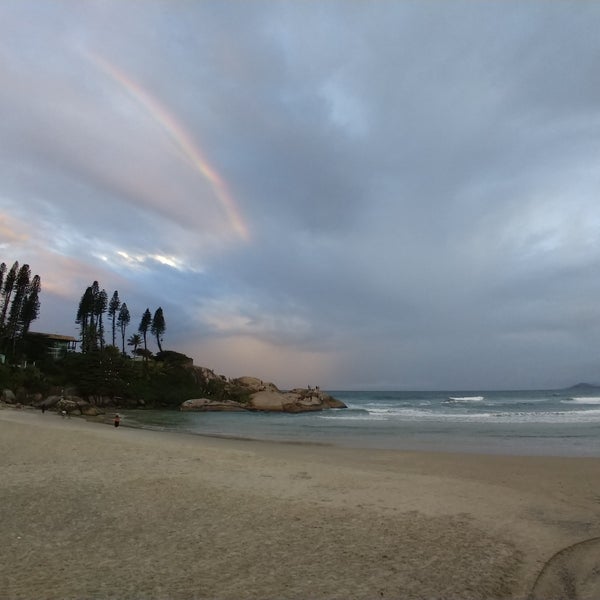 Photo taken at Praia da Joaquina by Alex S. on 5/20/2019