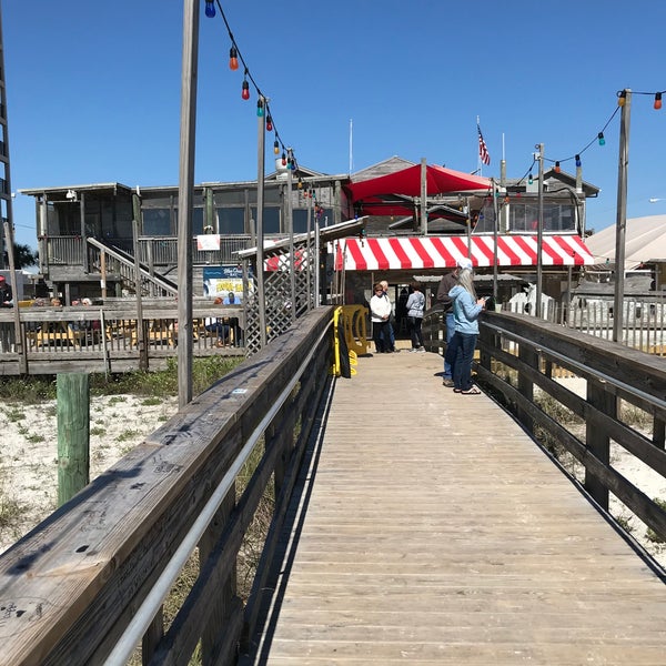 Foto diambil di Flora-Bama Lounge, Package, and Oyster Bar oleh Stews pada 2/28/2020