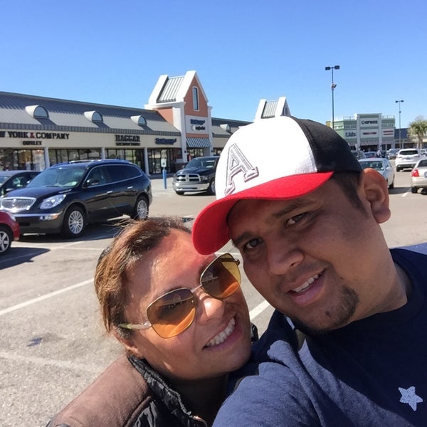 Photo taken at Tanger Outlet Gonzales by Ale A. on 2/17/2016