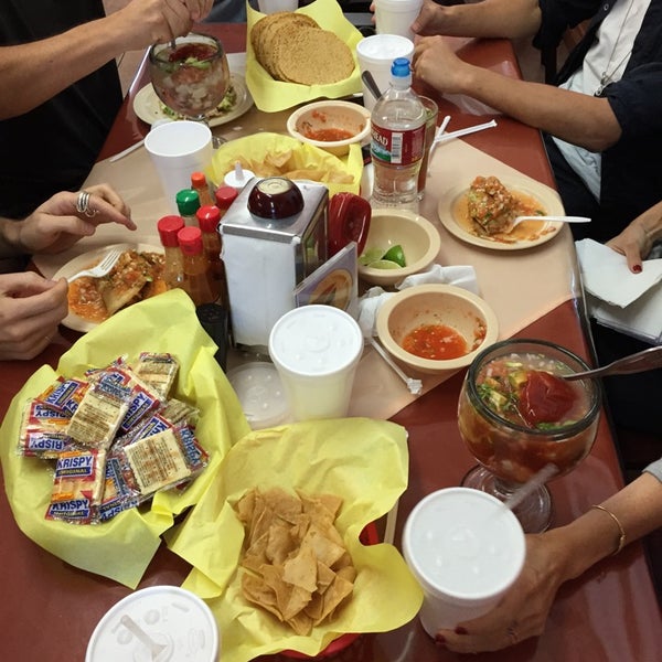 Photo taken at Mariscos 4 Vientos Taco Truck by Stephan W. on 11/4/2014