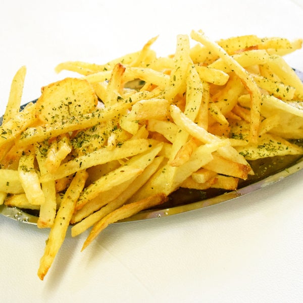 Best fresh cut french fries!! A tasty appetizer dish of homemade crispy potatoes in Athens. Great authentic food of greek mediterranean cuisine in Athens, Greece!