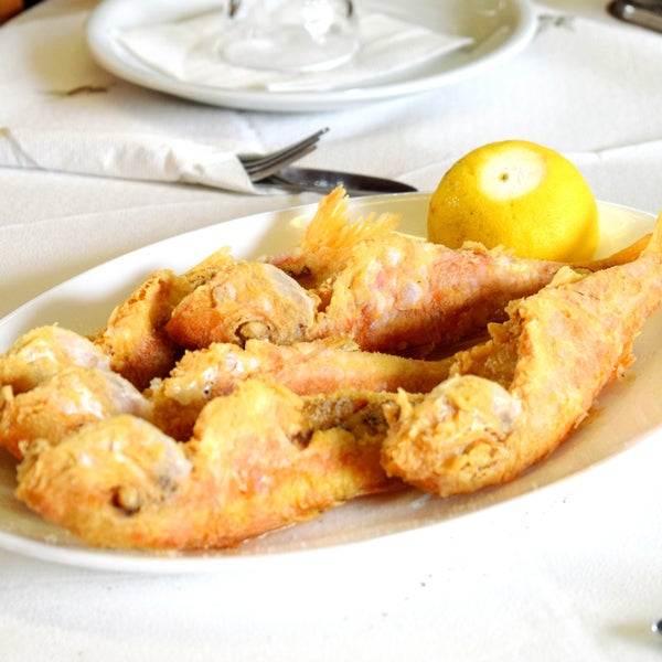 Fried red mullet dish with lemon! Healthy and fresh mediterranean fish restaurant in Athens, Center.