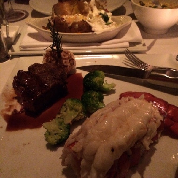 Photo taken at XO Prime Steaks by Gina C. on 12/8/2013
