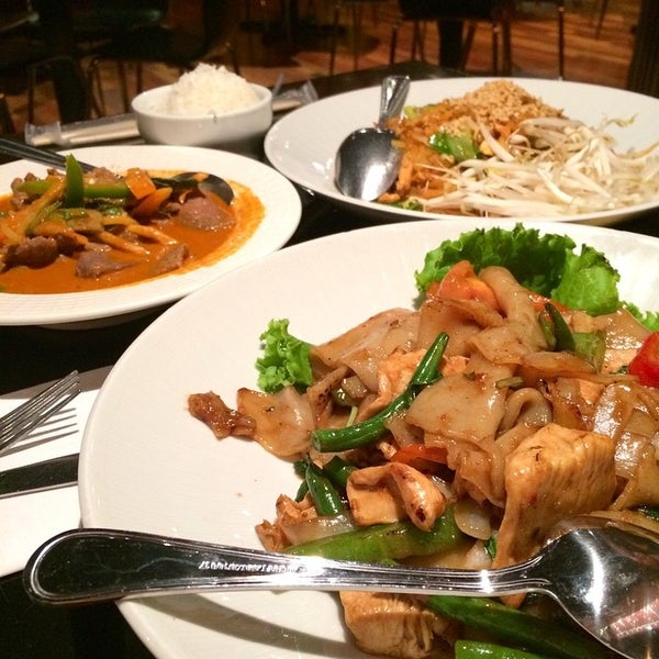 Photo taken at Thai Tanium Restaurant by Angel J. on 8/19/2014