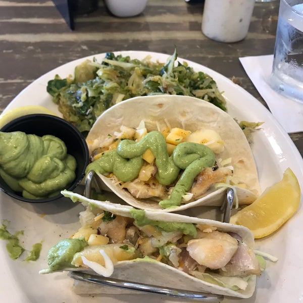 Photo taken at Seabreeze Island Grill by Pam V. on 3/13/2019