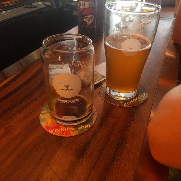 Photo taken at Winking Seal Beer Co. Taproom by Polina R. on 10/9/2018