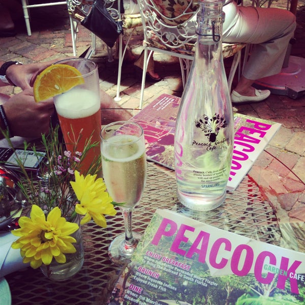 Photo taken at Peacock Garden Cafe by Paola A. on 5/5/2013