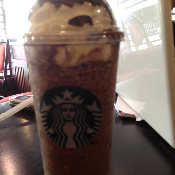 Photo taken at Starbucks by Tiago G. on 5/3/2013