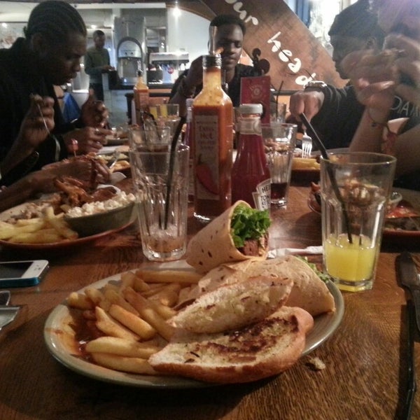 Photo taken at Nando&#39;s by Seher T. on 5/18/2013