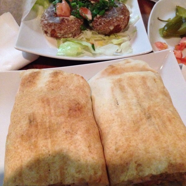 Photo taken at Byblos Lebanese Cuisine by AJ on 12/30/2013