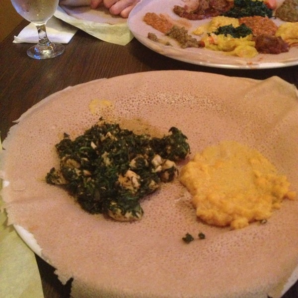 Photo taken at Queen Sheba Ethiopian Restaurant by Mochizuki S. on 5/25/2013
