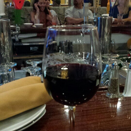 Photo taken at Toscana&#39;s Ristorante by Michelle P. on 7/2/2014