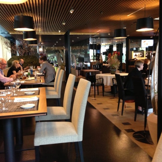 Photo taken at Avantgarde Restaurant&amp;Café by Tom N. on 11/7/2012