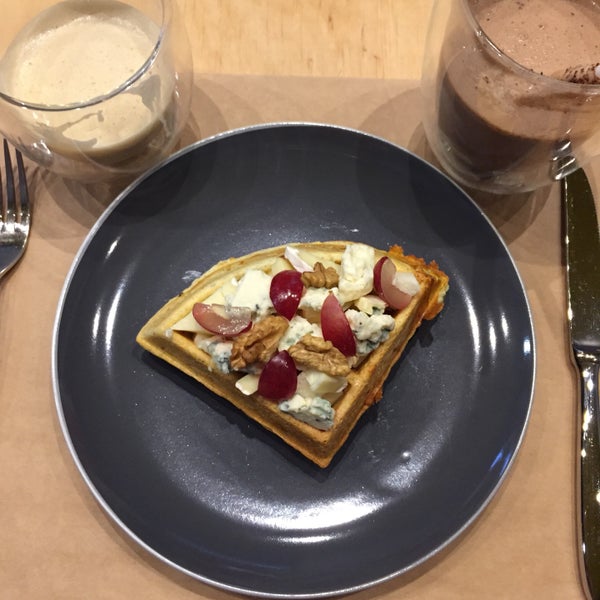 The owner is very friendly and talks with his clients a lot. The place is newly set up so there is not much decor inside. Chilly atmosphere and healthy food. The waffles are wheat free&coffee was good